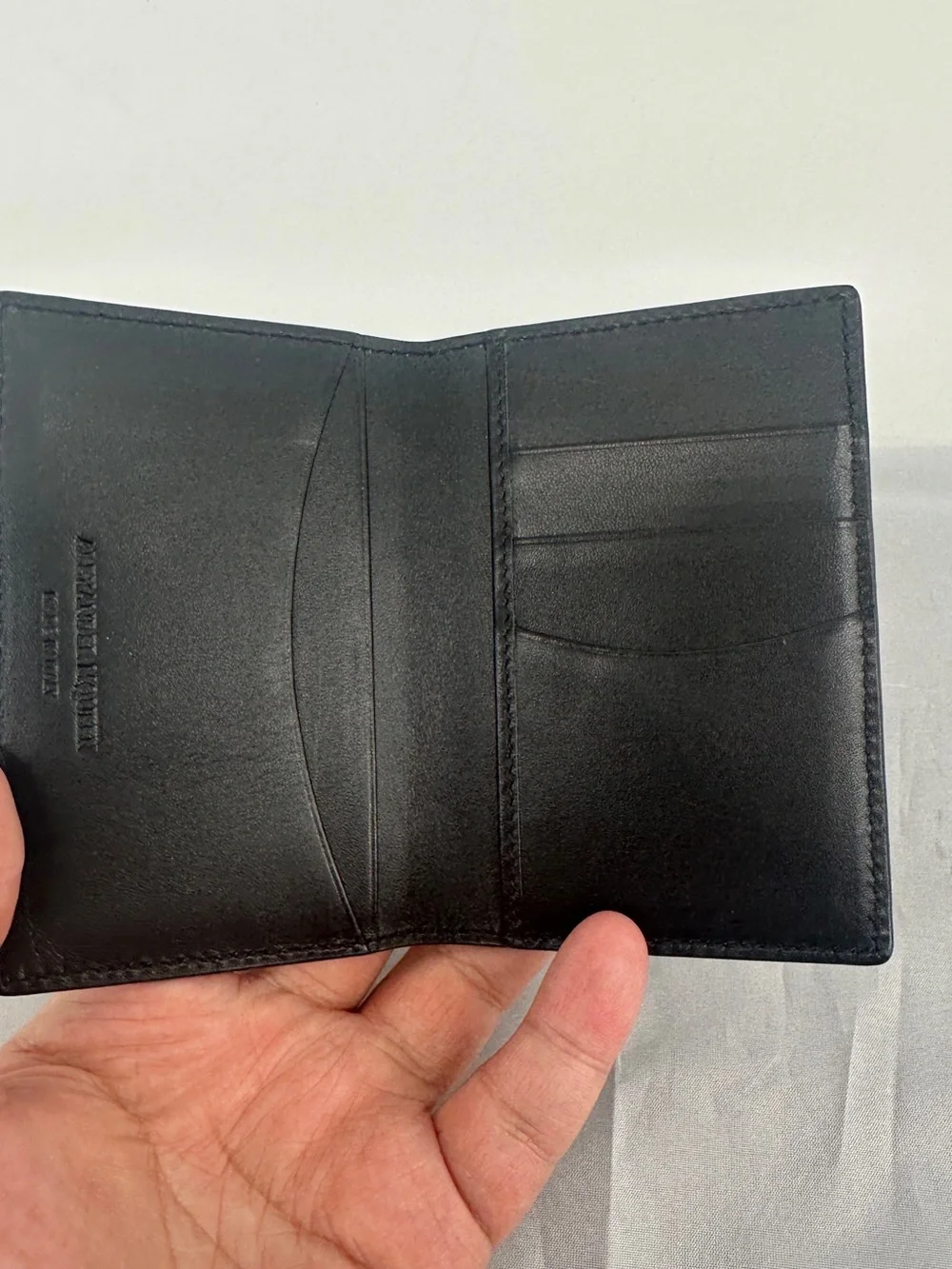 Alexander McQueen black feather bifold walket